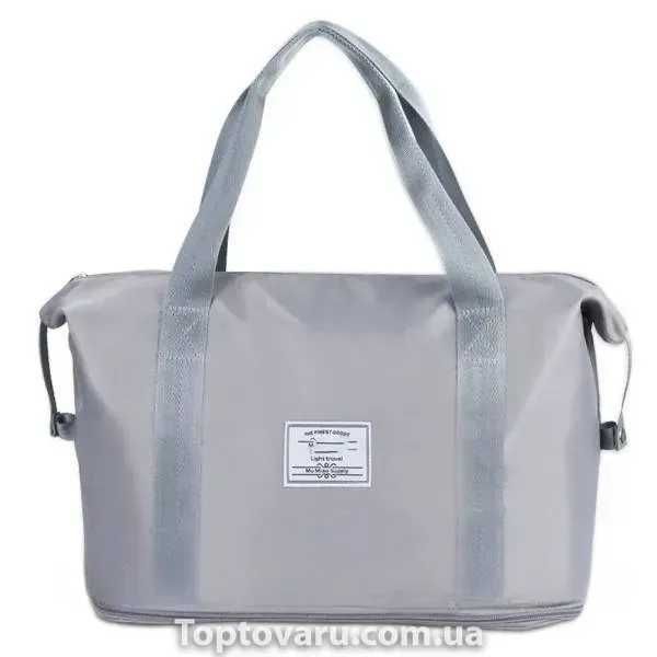 Сумка дорожня збільшуючася в глибину