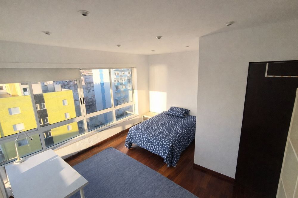 Quarto privado com vista mar em apartamento rooftop  Costa da Caparica
