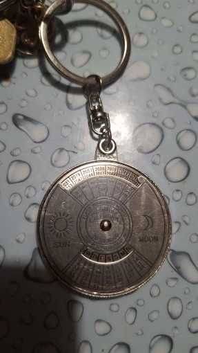 Брелок - календар на 50 років зі срібла, обертовий механізм