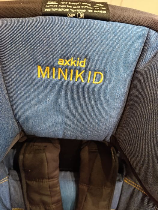 Fotelik samochodowy Axkid Minikid Bezwypadkowy,stan BDB  9-25 kg
