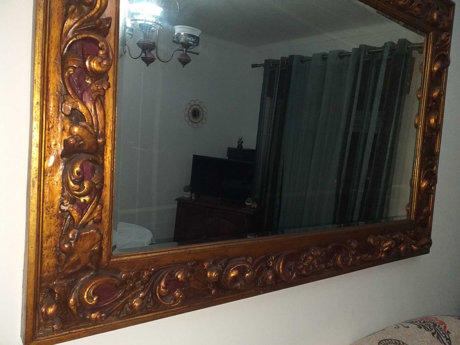 Espelho antigo em talha dourada