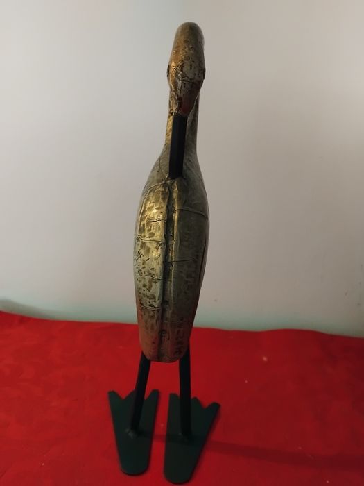 Escultura em madeira e ferro fundido