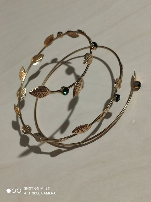 Спіральний браслет на плече (arm cuff).