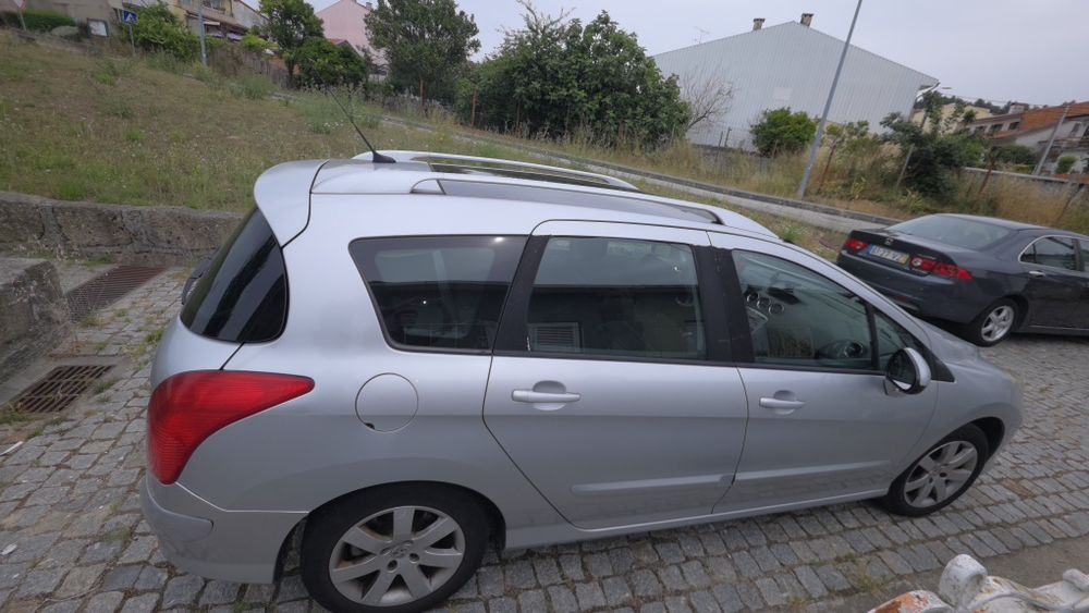 Peugeot 308 SW 1.6 HDi (2010) – Teto Panorâmico