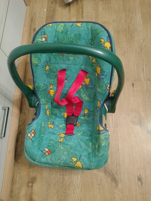 Sprzedam fotelik nosidełko samochodowe Römero