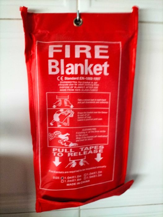 Manta ignifuga e extintor