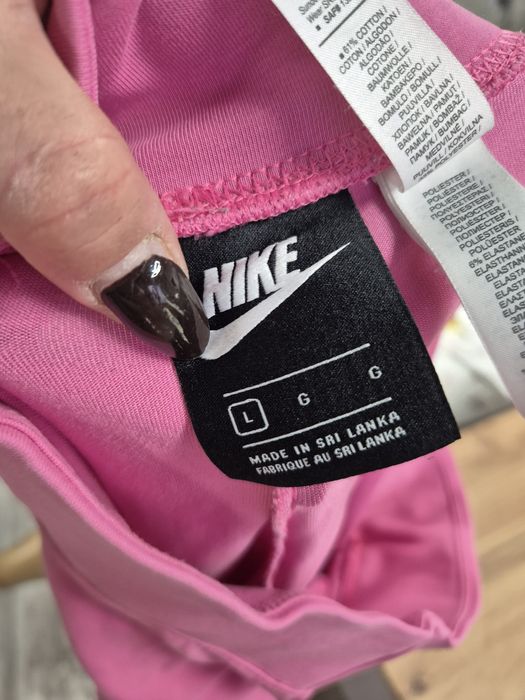 Leginsy różowe Nike rozm L