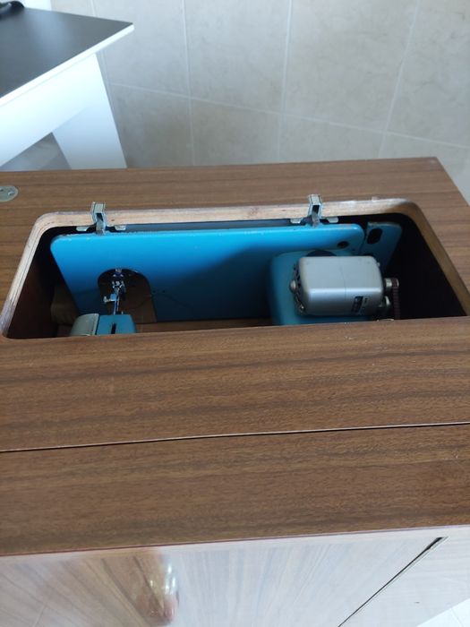 Máquina costura elétrica