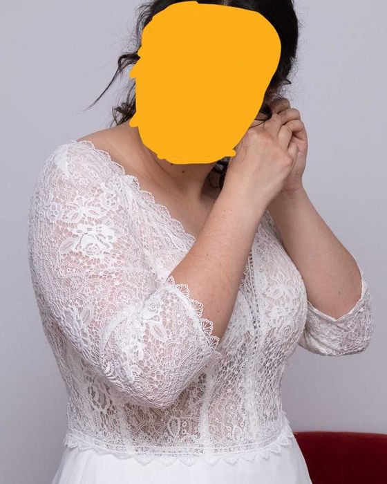 Biała, koronkowa suknia ślubna w stylu boho