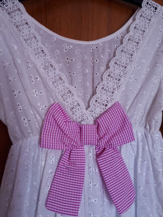 Vestido novo com laço