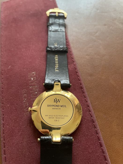 Relogio breitling cronomat aço e ouro e raymond weill modelo othelo.