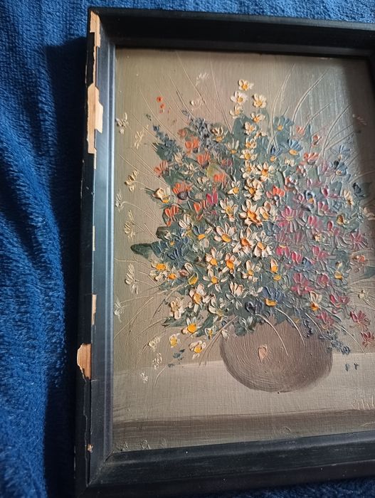 Obrazy kwiaty w wazonie