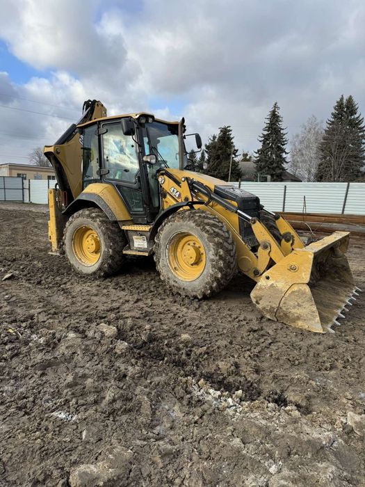 Екскаватор навантажувач  CAT-434