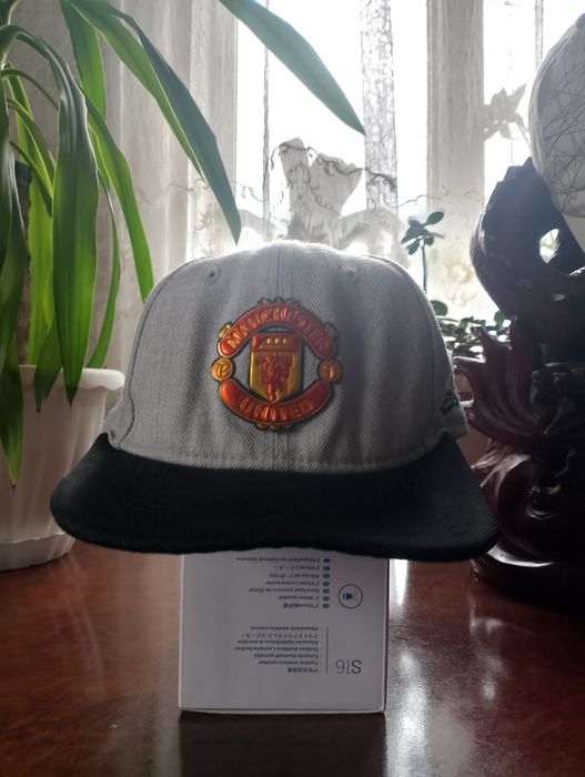 Кепка New Era 9FIFTY  MU
Manchester United

Річ: Оригінальний снепбек, об'ємний прогумований 3D-логотип (приємний на дотик).

Стан: 9.5/10 (мінімальні