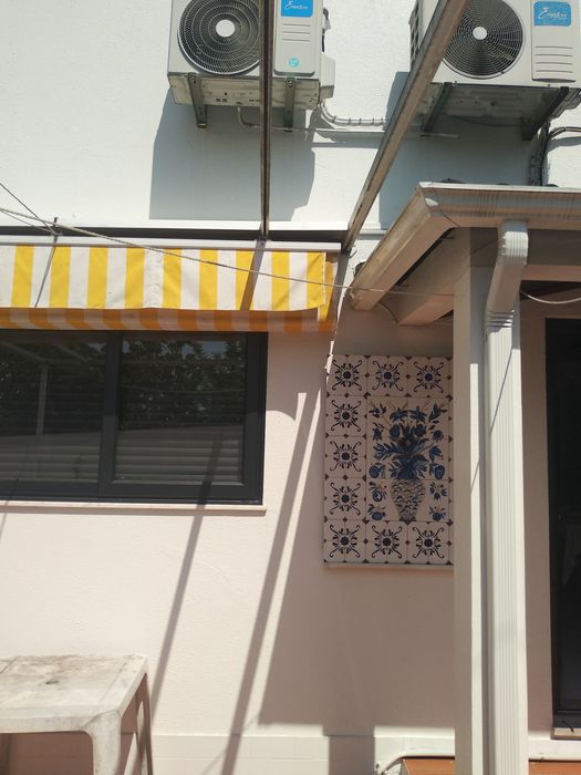 Pérgola de encostar com tecido