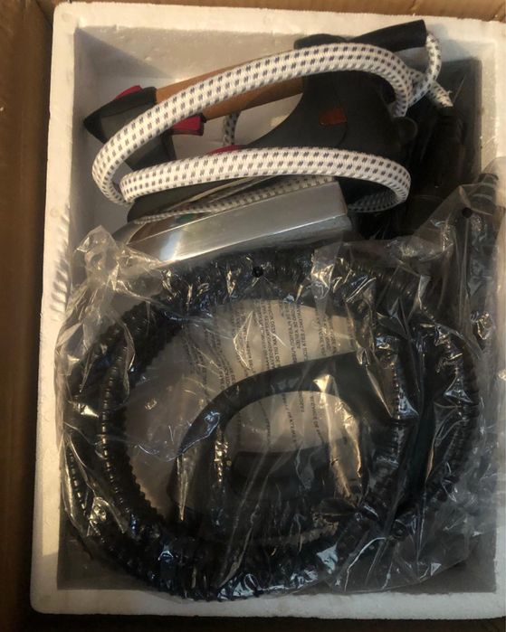 Máquina de limpeza a vapor e ferro incluido.