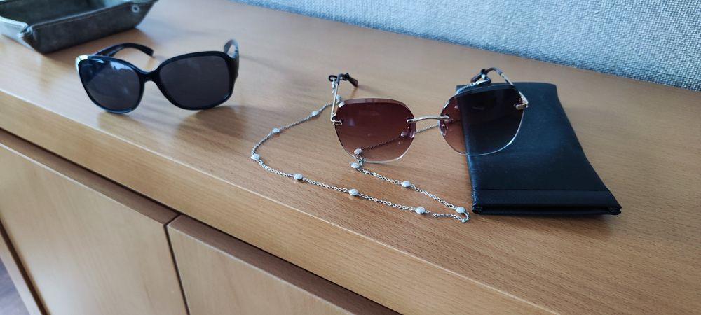 Dois Óculos de sol64409563665794123