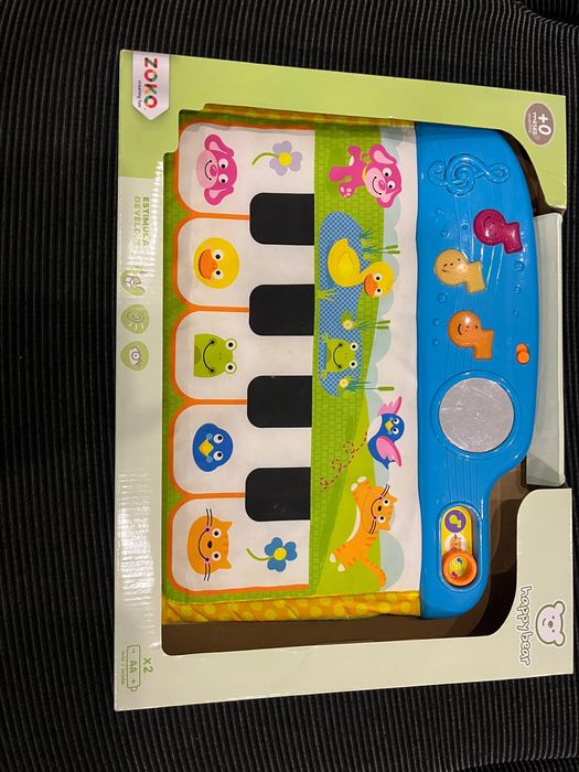 Piano musical de bebé em pano