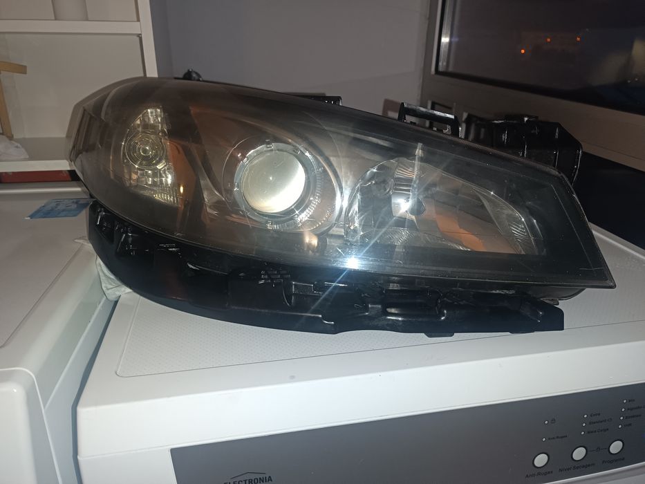 Farol xenon Renault laguna lado direito
