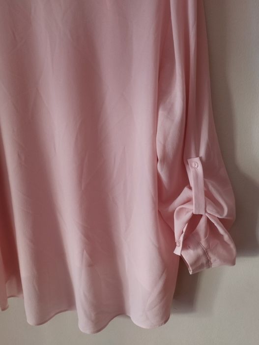 Túnica para sra cor de rosa tecido fino e mais compridinha atrás.