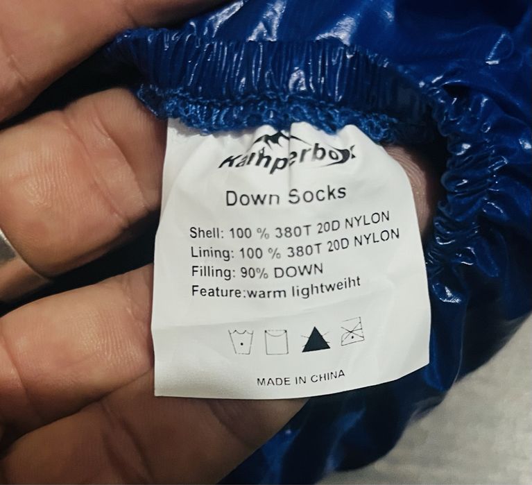 Botins azuis de penas