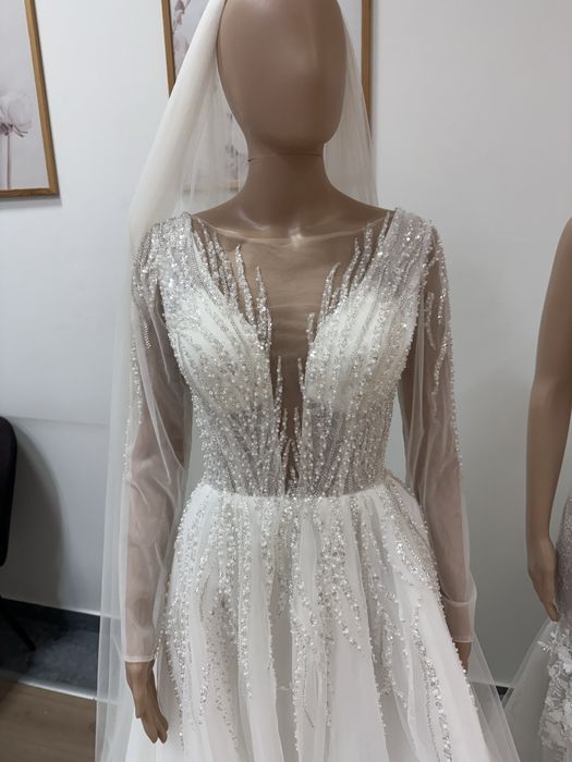 Nowa piekna błyszcząca suknia ślubna bogato zdobiona z rękawem 38