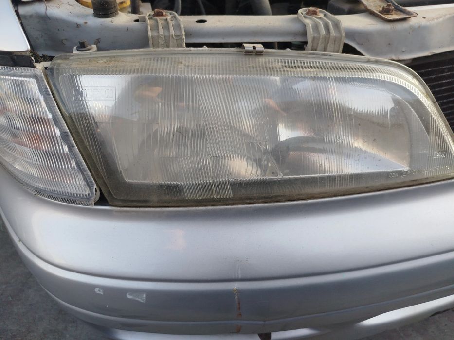 Ótica / farol direita NISSAN Primera Wagon (WP11)