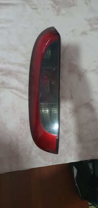 Stop esquerdo opel corsa