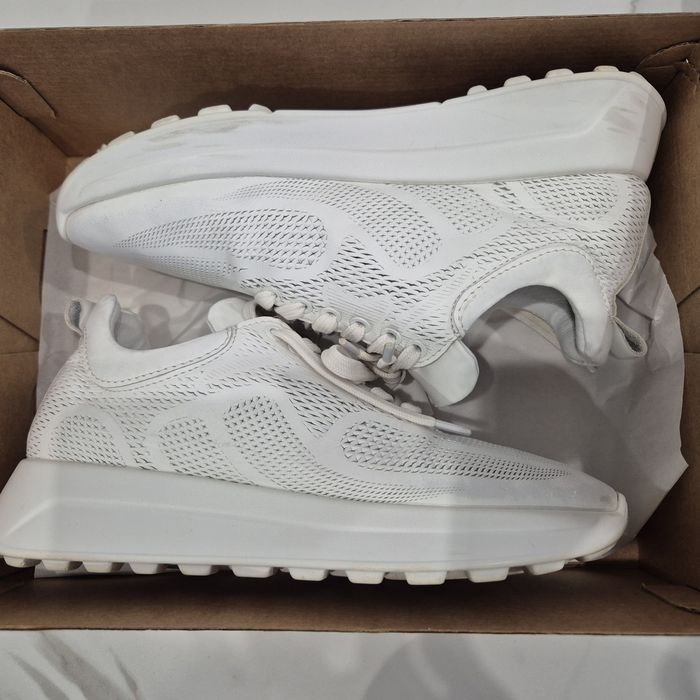 Шкіряні білі кросівки