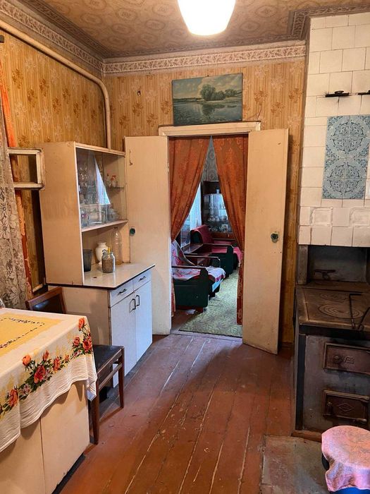 Продам 1/2 будинка в м.Богодухові