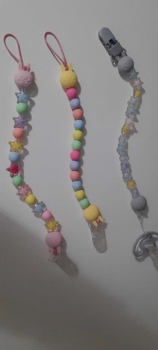 Prendedor de chupeta e lembranças de natal