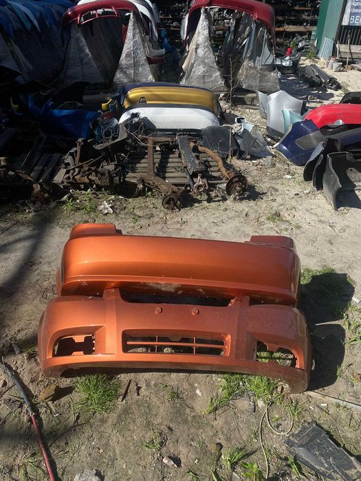 Бампер шевроле авео помаранчевий т250 Ціна одного