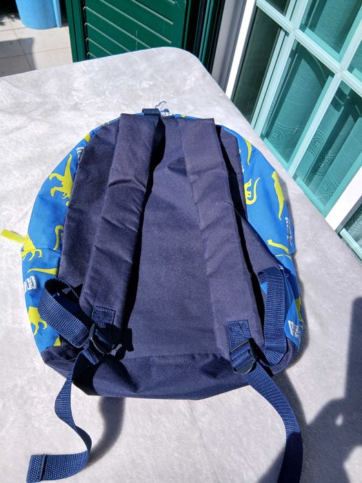 Mochila escolar azul com dinossauros kids