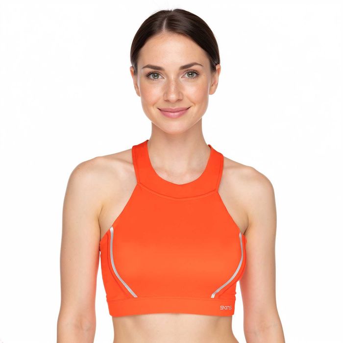 SKINS DNAmic Speed biustonosz sportowy kompresyjny roz. S pomarańczowy