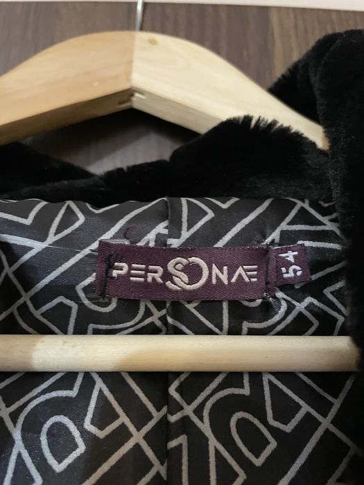 Жіноча шуба чорного кольору