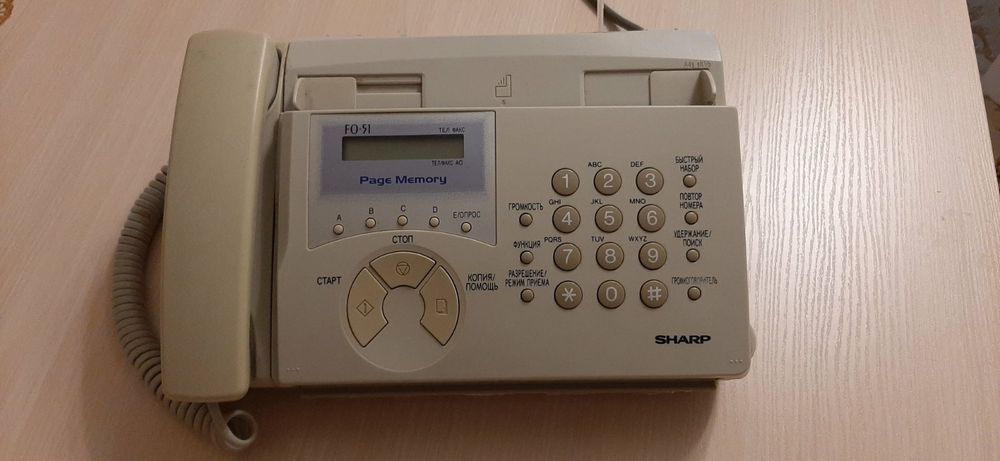 Факс  - телефон   Sharp