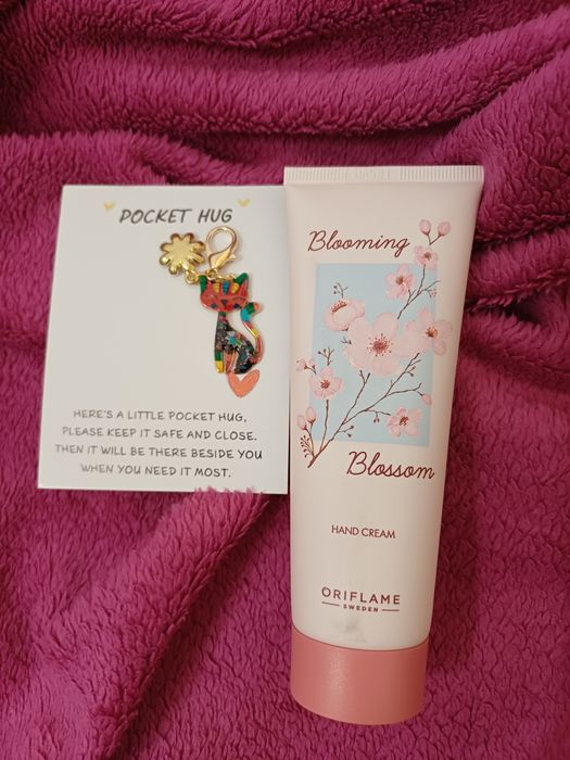 Creme de mãos Oriflame e chaveiro Gato