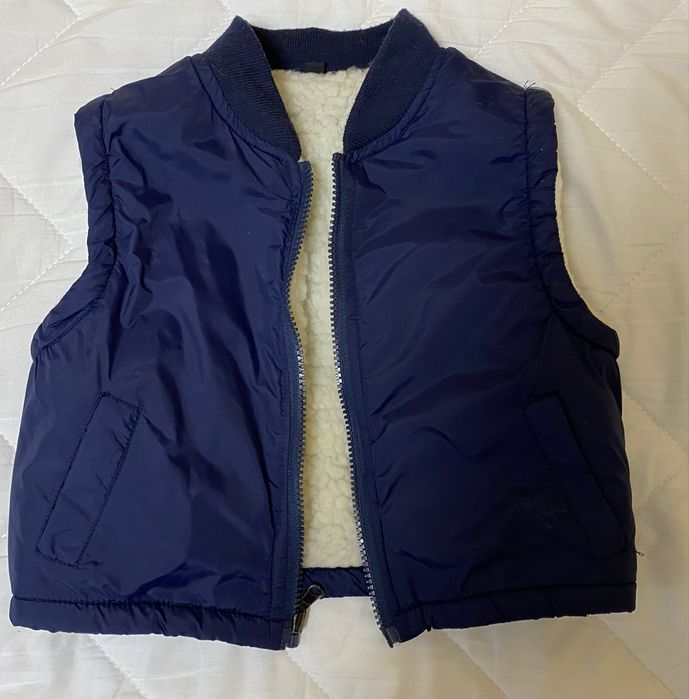 Жилетка тепла на овчині орієнтовно 2-3 роки