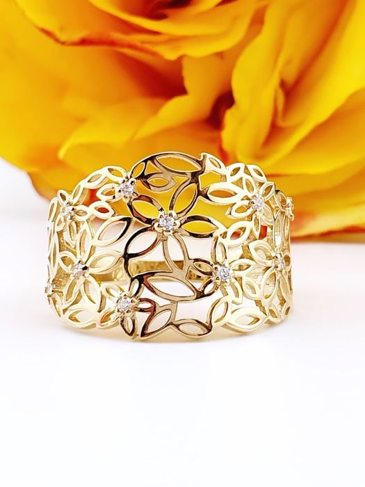Złoty, nowy ażurowy pierścionek z cyrkoniami 585