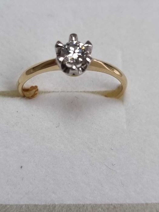 Pierścionek złoty z brylantem 0.26 ct