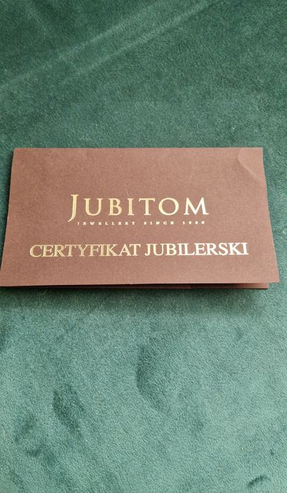 Złoty pierścionek z diamentem