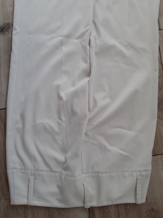 Spodnie kremowe eleganckie