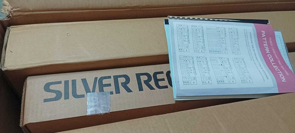 Maquina de tricô ainda embalada