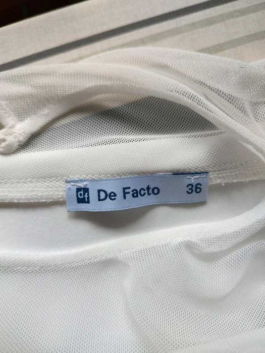 Biała (śmietankowa) bluzka z falbanką na jedno ramię