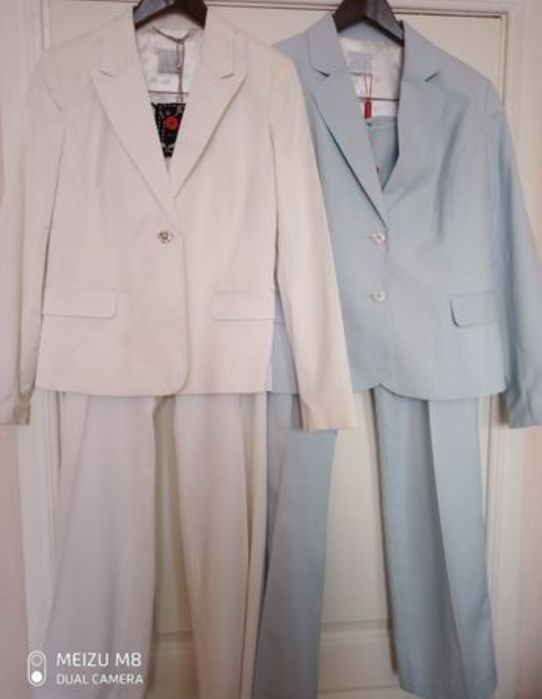 Жіночі брючні костюми Castro.