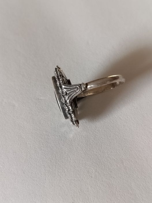 Antigo anel em prata com pedra ônix