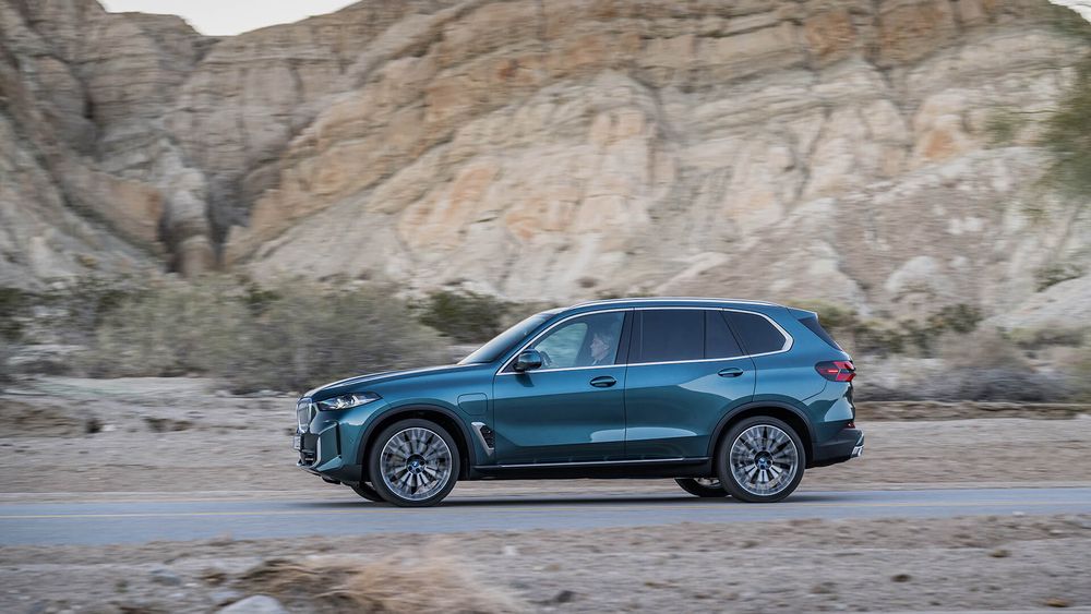 BMW X5 niebieskie lewy bok