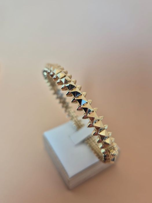 Złota bransoletka typu Cartier sztywna bangle kolce p. 585