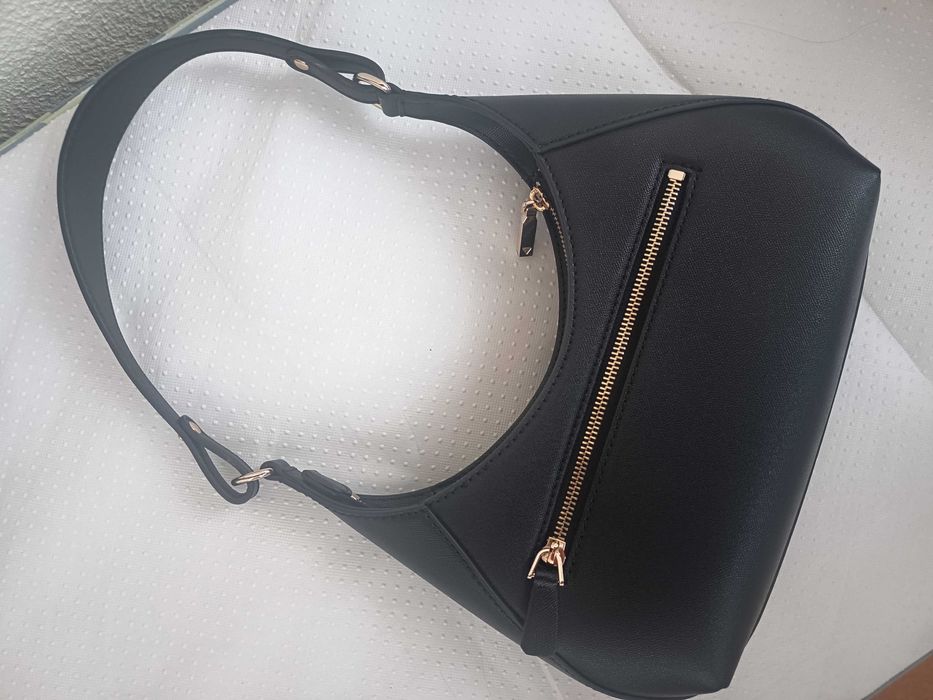 Mala Guess.