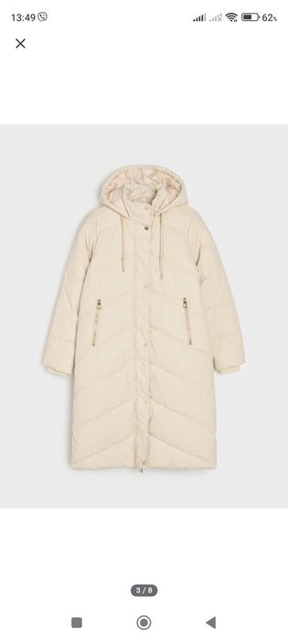 Продаю бежевый пуховик